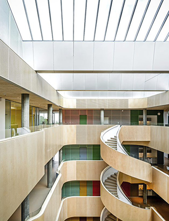 An atrium rooflight installation in a healthcare building with spiral staircase