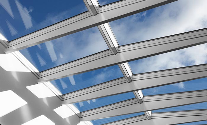 Clear blue sky view through roof skylights