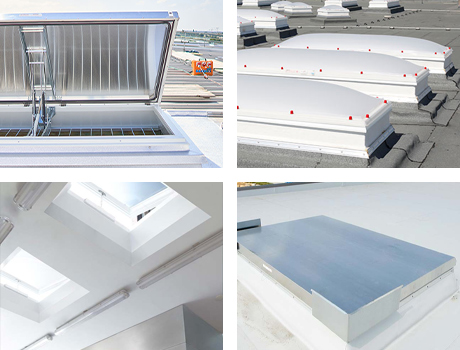 Priveliște exterioară cu mai multe cupole luminatoare dreptunghiulare