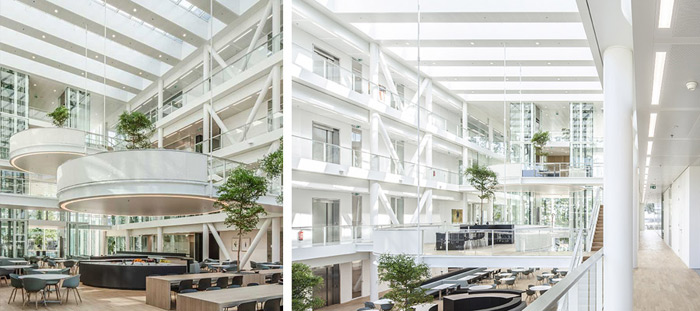 Dagslys lyser opp dette arkitektonisk inspirerende forskningsbygget fra alle kanter.